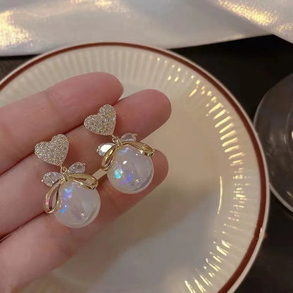 2022 Nueva tendencia Pendientes largos de perlas de simulación Pendientes colgantes de boda con diamantes de imitación y flores para mujer Pendientes de joyería coreana de moda