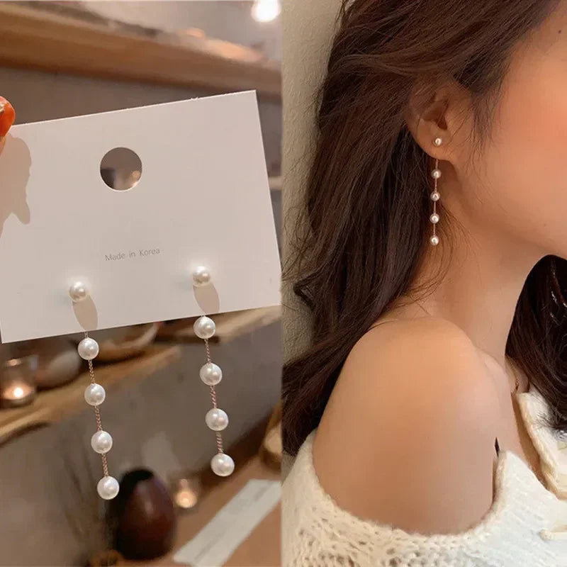 2022 Nueva tendencia Pendientes largos de perlas de simulación Pendientes colgantes de boda con diamantes de imitación y flores para mujer Pendientes de joyería coreana de moda