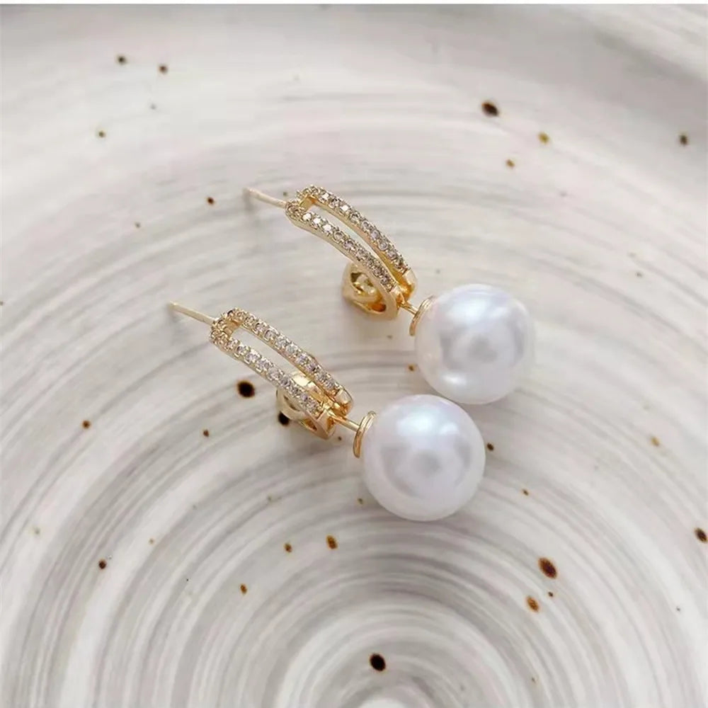 2022 Nueva tendencia Pendientes largos de perlas de simulación Pendientes colgantes de boda con diamantes de imitación y flores para mujer Pendientes de joyería coreana de moda