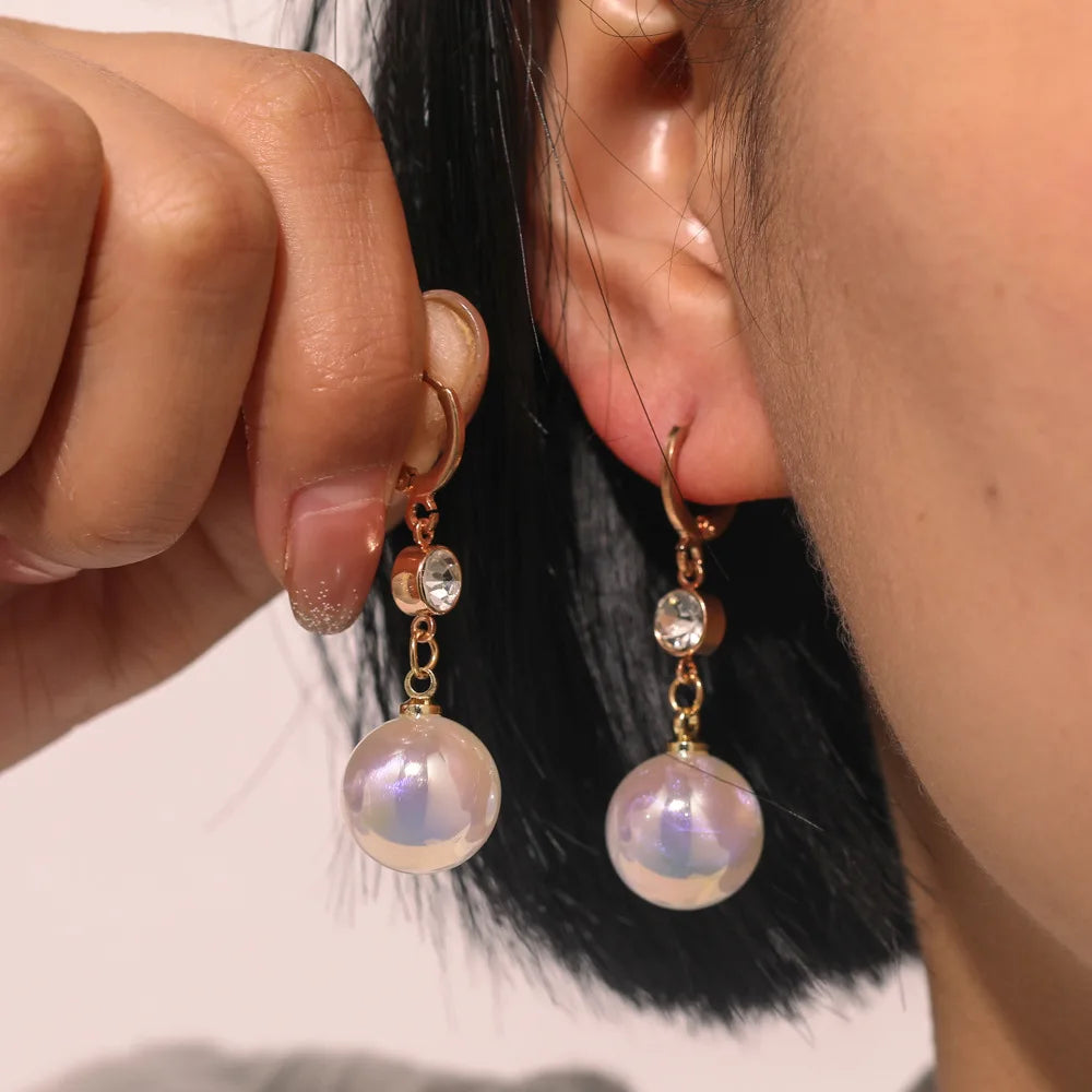 2022 Nueva tendencia Pendientes largos de perlas de simulación Pendientes colgantes de boda con diamantes de imitación y flores para mujer Pendientes de joyería coreana de moda