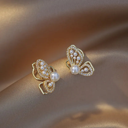 2022 Nueva tendencia Pendientes largos de perlas de simulación Pendientes colgantes de boda con diamantes de imitación y flores para mujer Pendientes de joyería coreana de moda