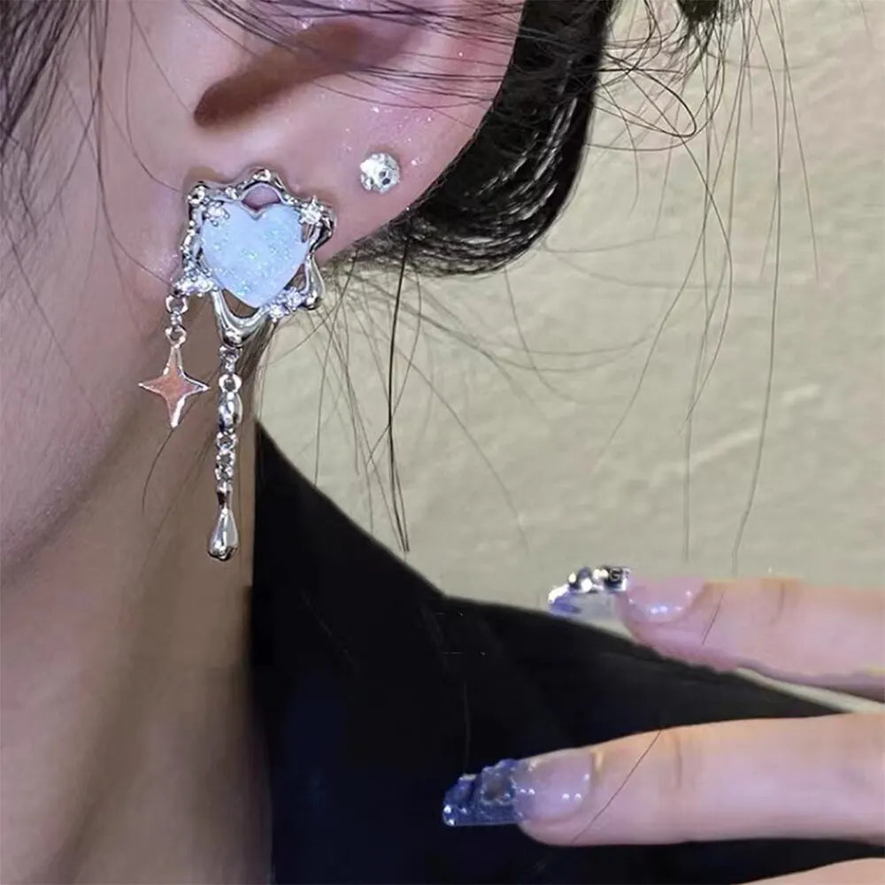 Pendientes de borlas para mujer, piedra lunar, amor, luz envolvente romántica, extravagancia, pendientes Mangxing de alto sentido, pendientes de tendencia Su