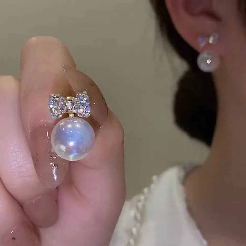 2022 Nueva tendencia Pendientes largos de perlas de simulación Pendientes colgantes de boda con diamantes de imitación y flores para mujer Pendientes de joyería coreana de moda