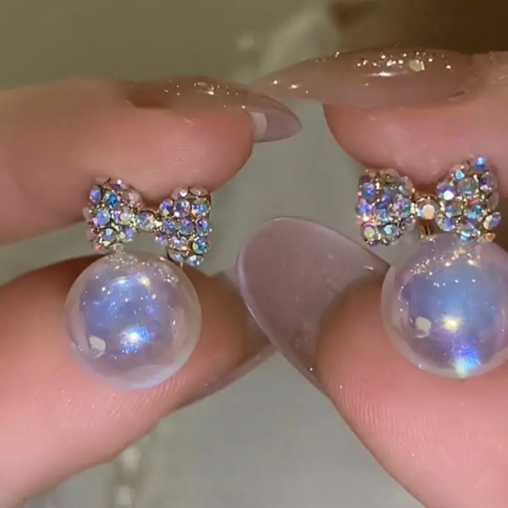 2022 Nueva tendencia Pendientes largos de perlas de simulación Pendientes colgantes de boda con diamantes de imitación y flores para mujer Pendientes de joyería coreana de moda