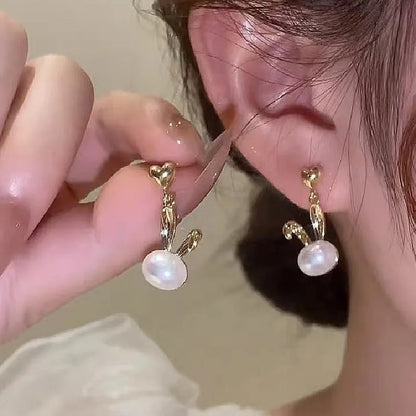 2022 Nueva tendencia Pendientes largos de perlas de simulación Pendientes colgantes de boda con diamantes de imitación y flores para mujer Pendientes de joyería coreana de moda